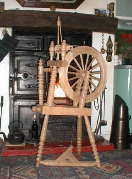 Spinning wheel turned on wood lathe